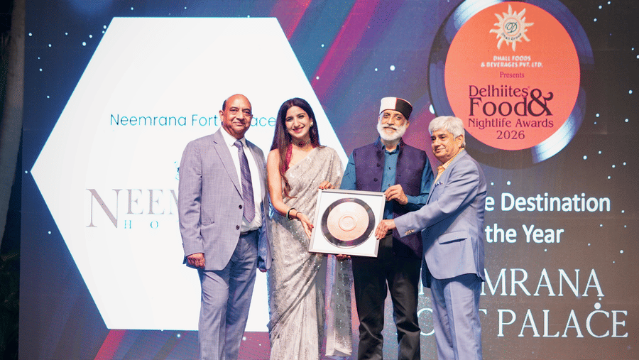 The representatives of Neemrana Fort-Palace accepting the 'Destination of the Year' award at the 2026 Delhiites Food & Nightlife Awards.