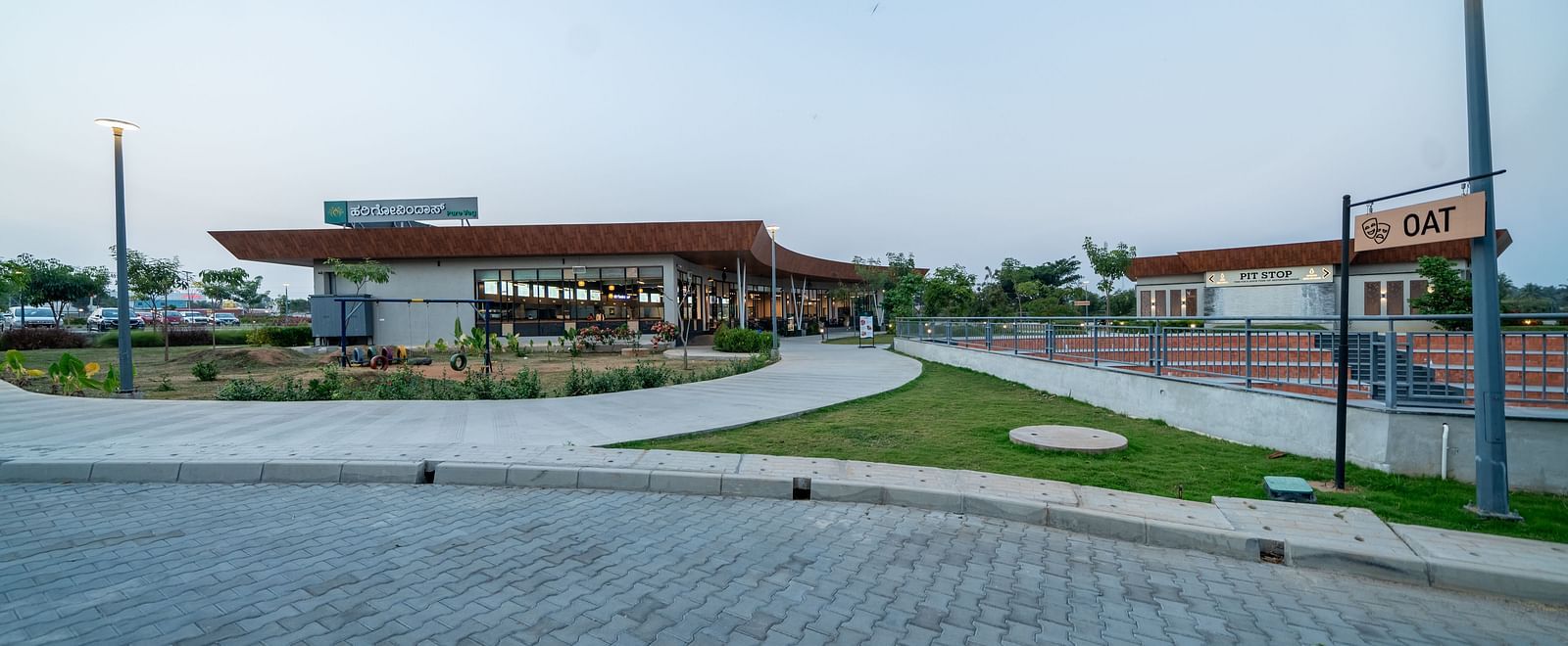 Long view of Hari Govinda's restaurant against a clear sky