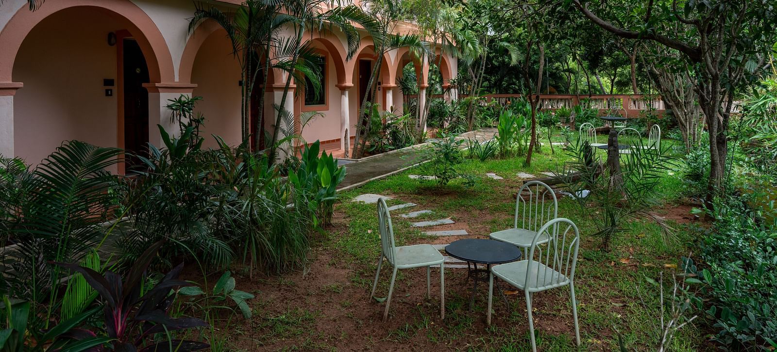 Interior of a Resort property with seating arrangement of table and chairs.