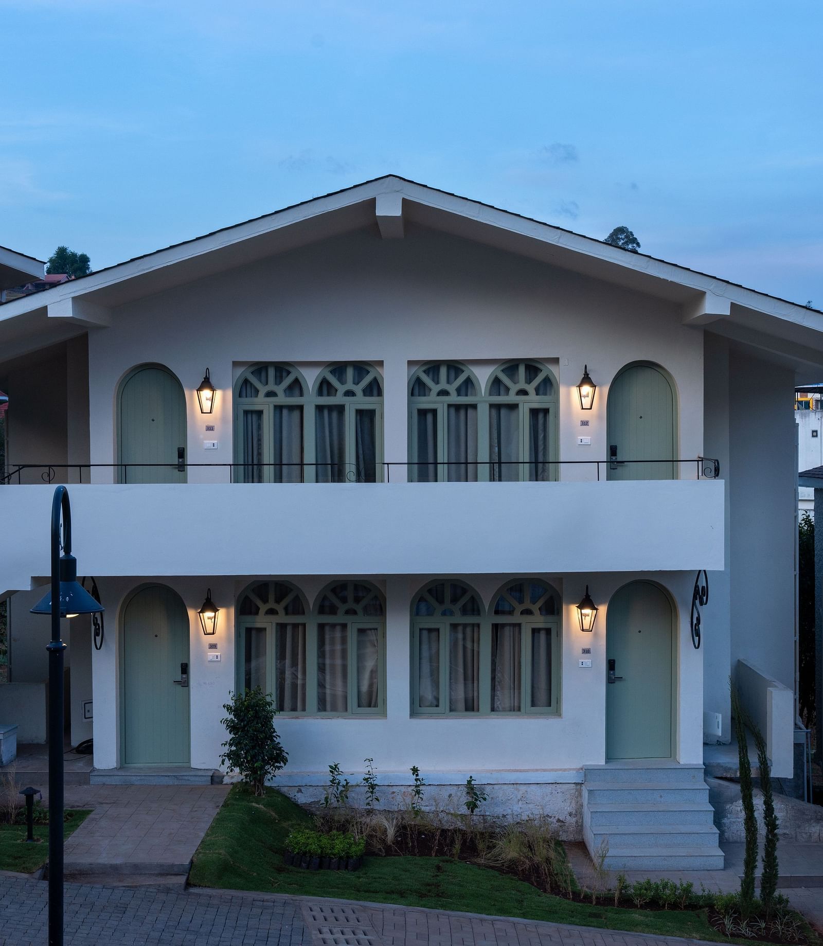 A close up shot of a building with rooms inside it | Mango Hill Shola, Ooty
