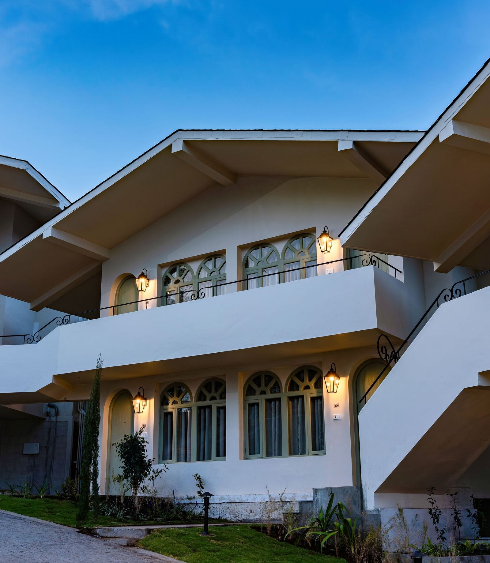 Side view of the rooms with a street lamp in view | Mango Hill Shola, Ooty