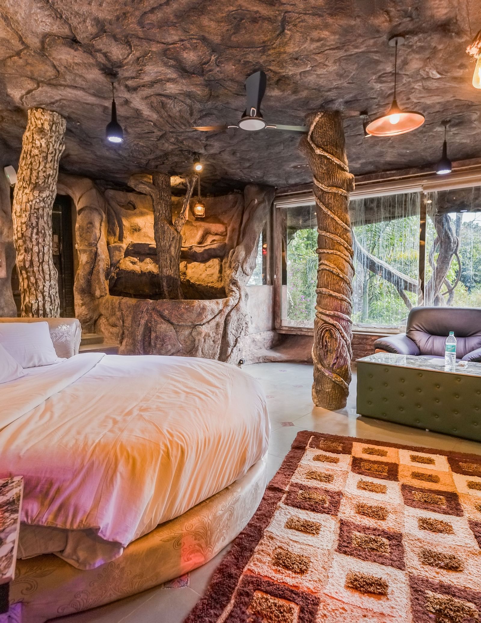 round bed in the Cave Room at Parakkat Nature Hotel and Resorts Munnar 8