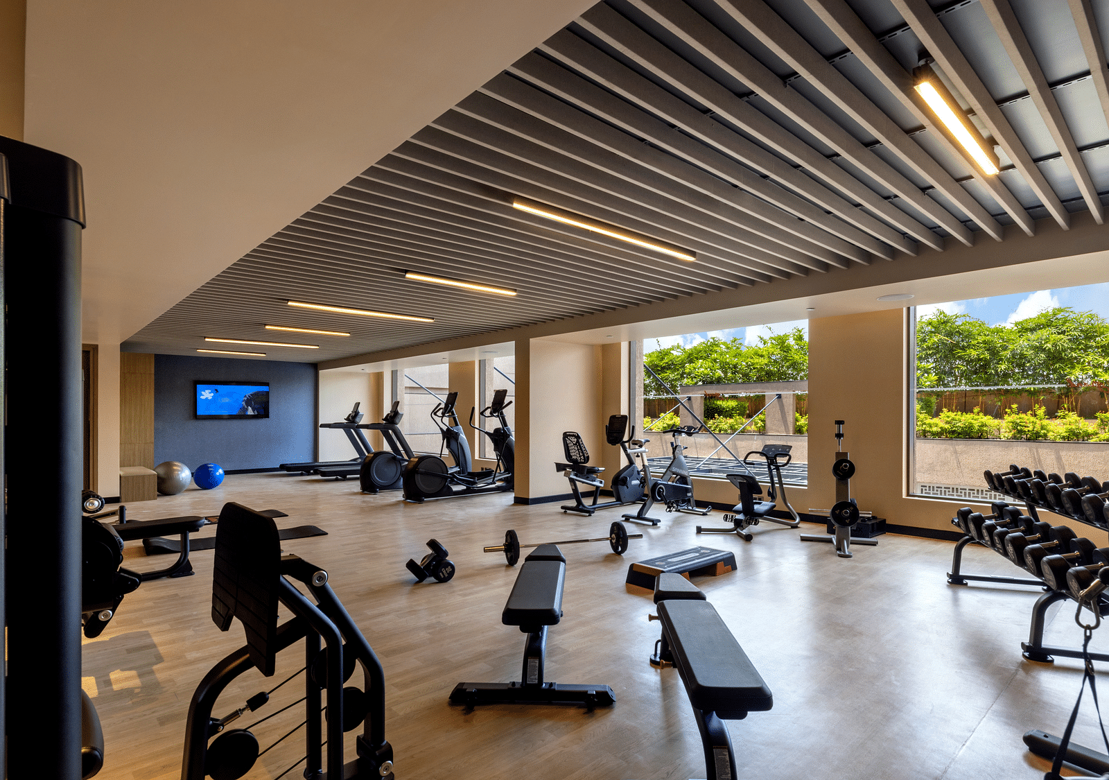 A view of a well-appointed hotel fitness centre, ready for workouts - Grand Madurai by GRT Hotels