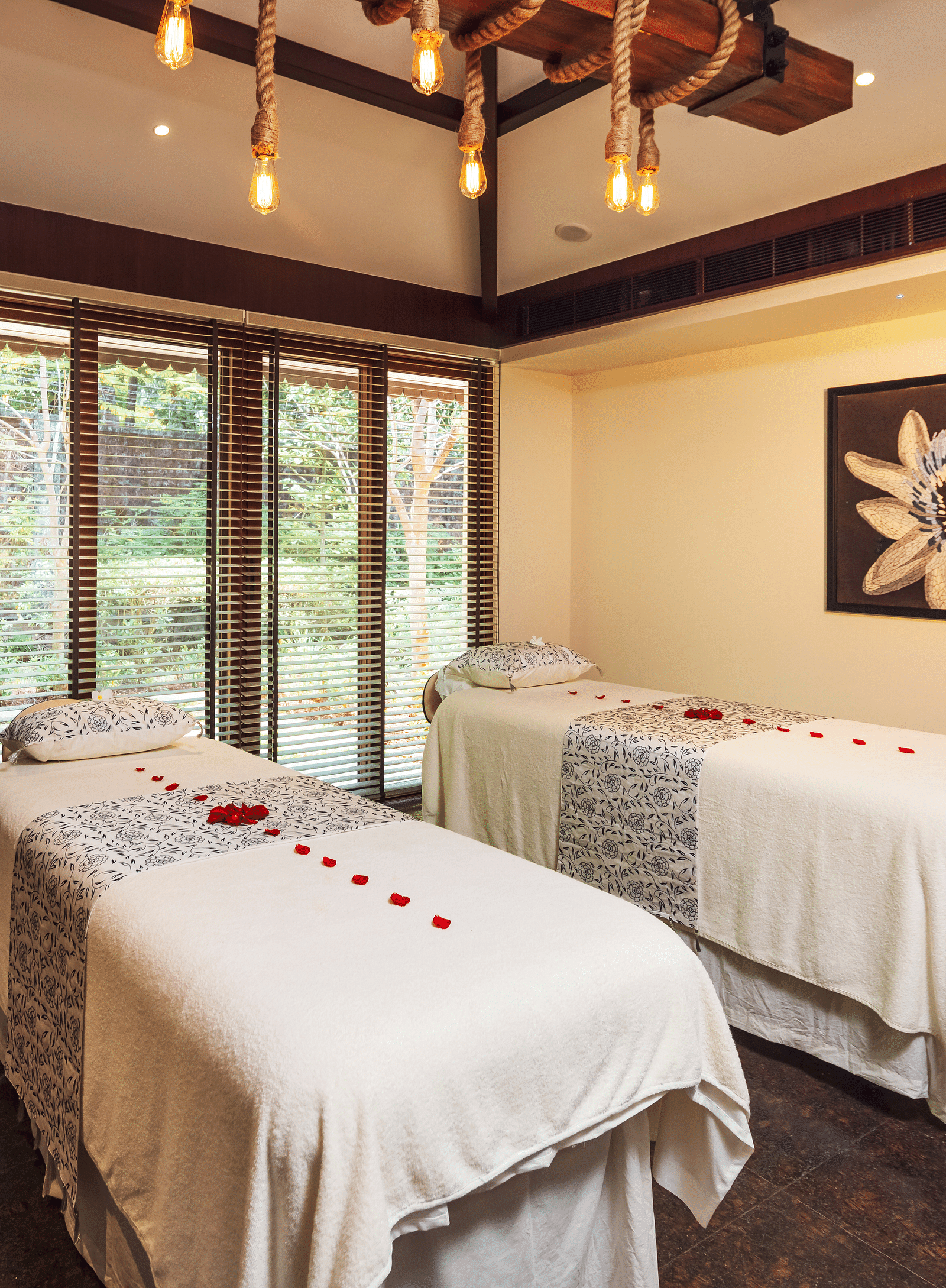 A massage room with two massage tables for couples massage - Gamyam Retreat