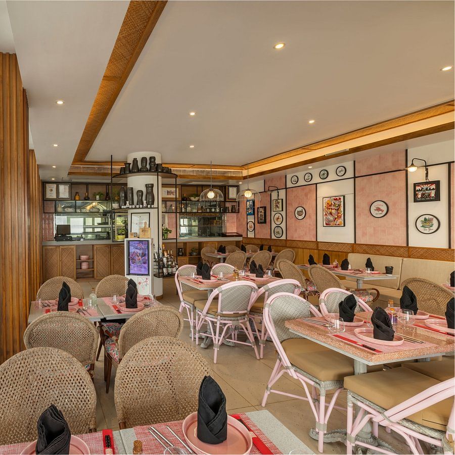 Modern dining space with vibrant decor at Heritage Village Resorts & Spa