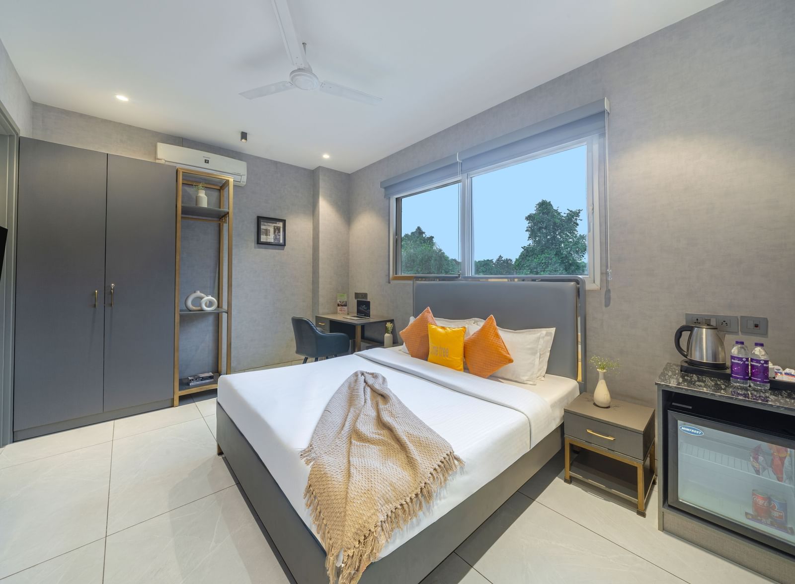 Deluxe king-size room at Lime Tree Hotels Ystays Greater Noida with modern design