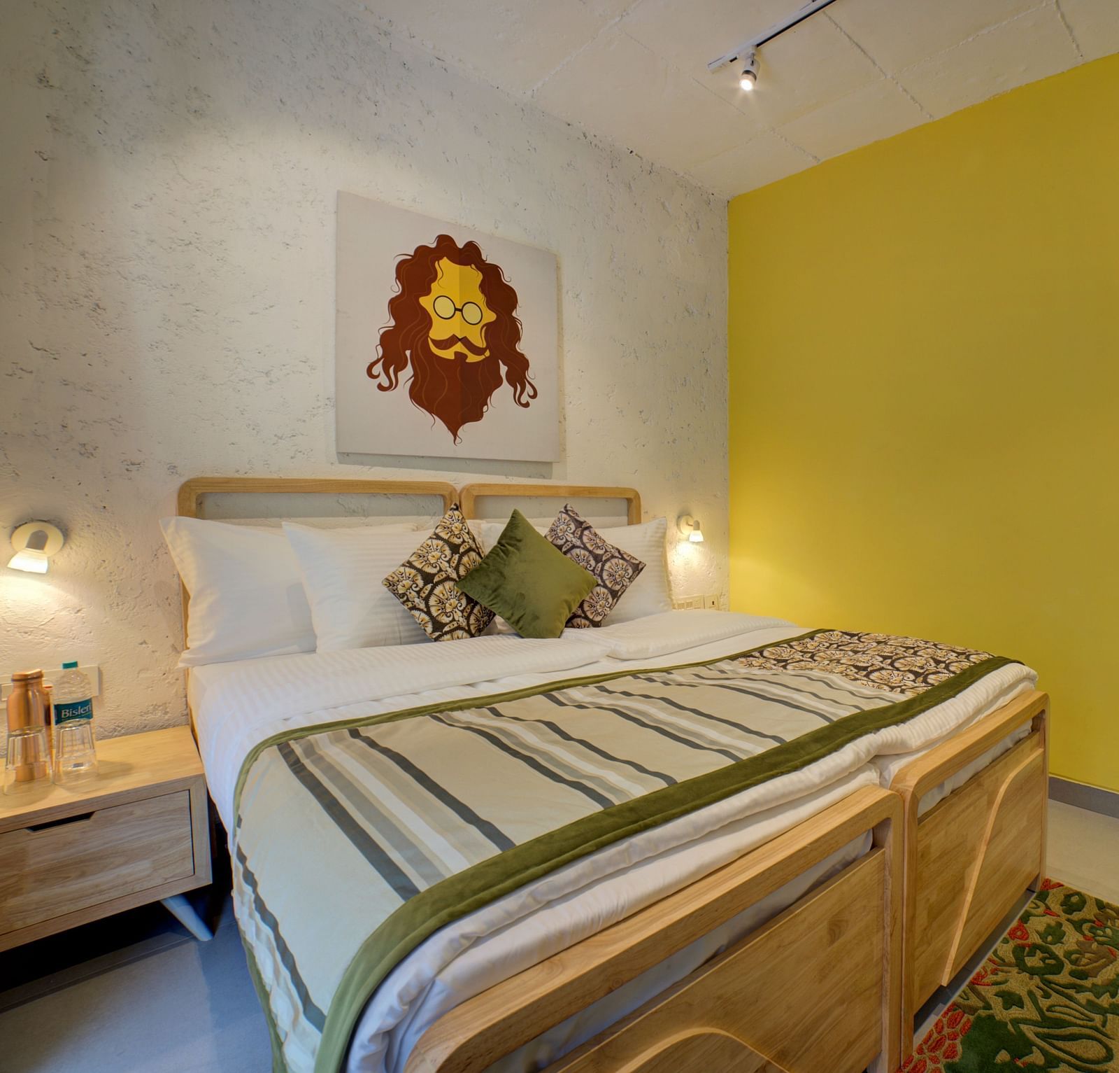 A bedroom a large bed with side lamps - Bedzzz, Rishikesh