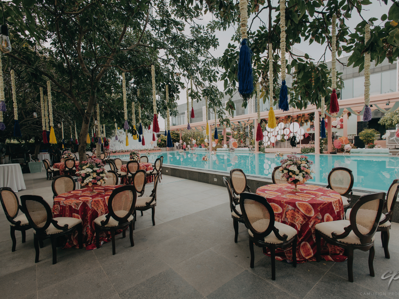 Seating arrangements next to the swimming pool - Karma Lakelands.