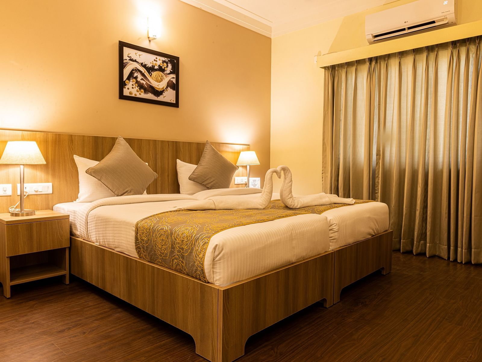 A double bed inside Premium One Bedroom Suite - Starlit Suites, Tirupati