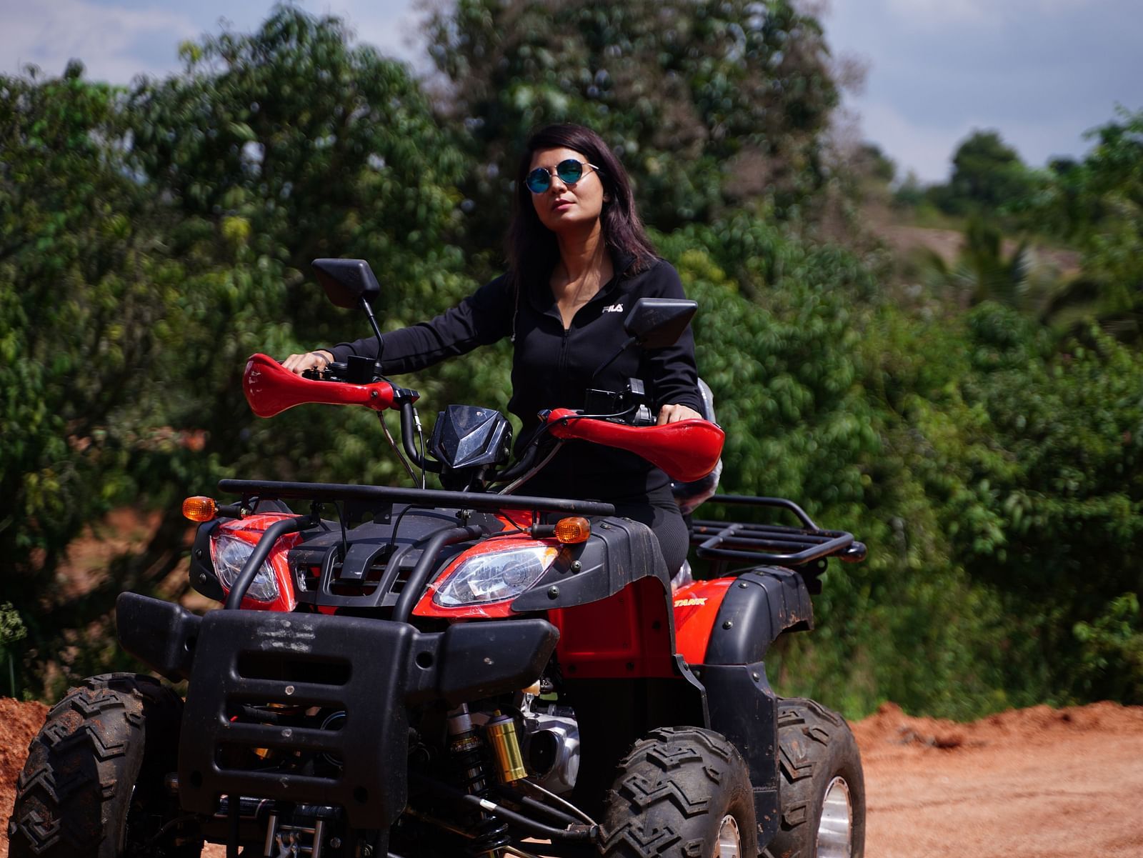 A guest riding the atv bike at Ravishing Retreat 
