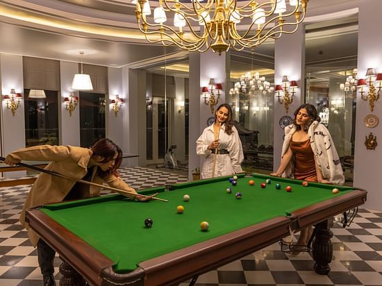 Three women playing snooker  - The Manor Luxury Hotel, Shimla