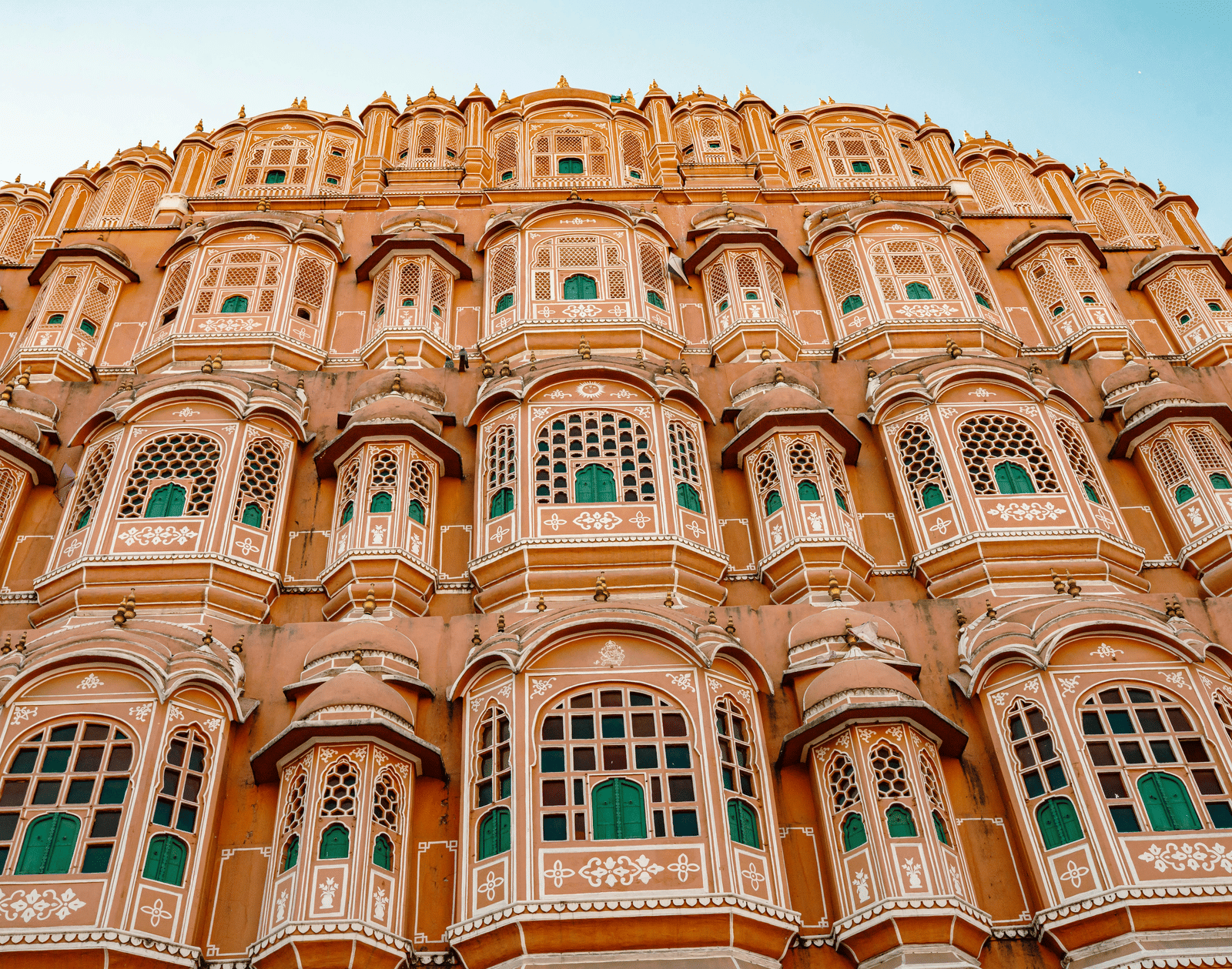The iconic Hawa Mahal with its stunning honeycomb facade and countless latticed windows, a masterpiece of Rajput architecture - itinerary for Jaipur.