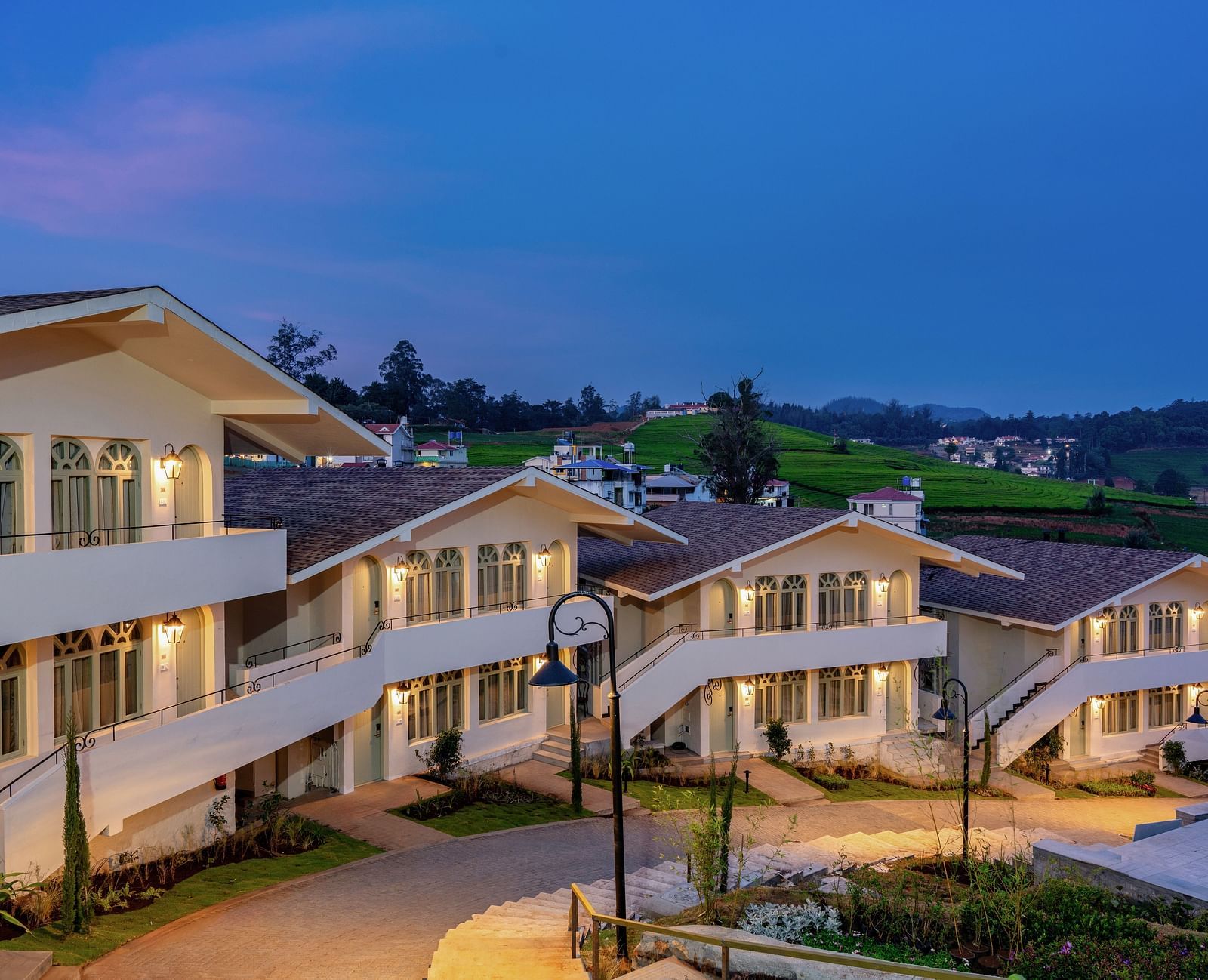 A facade of few buildings in a resort | Mango Hill Shola, Ooty