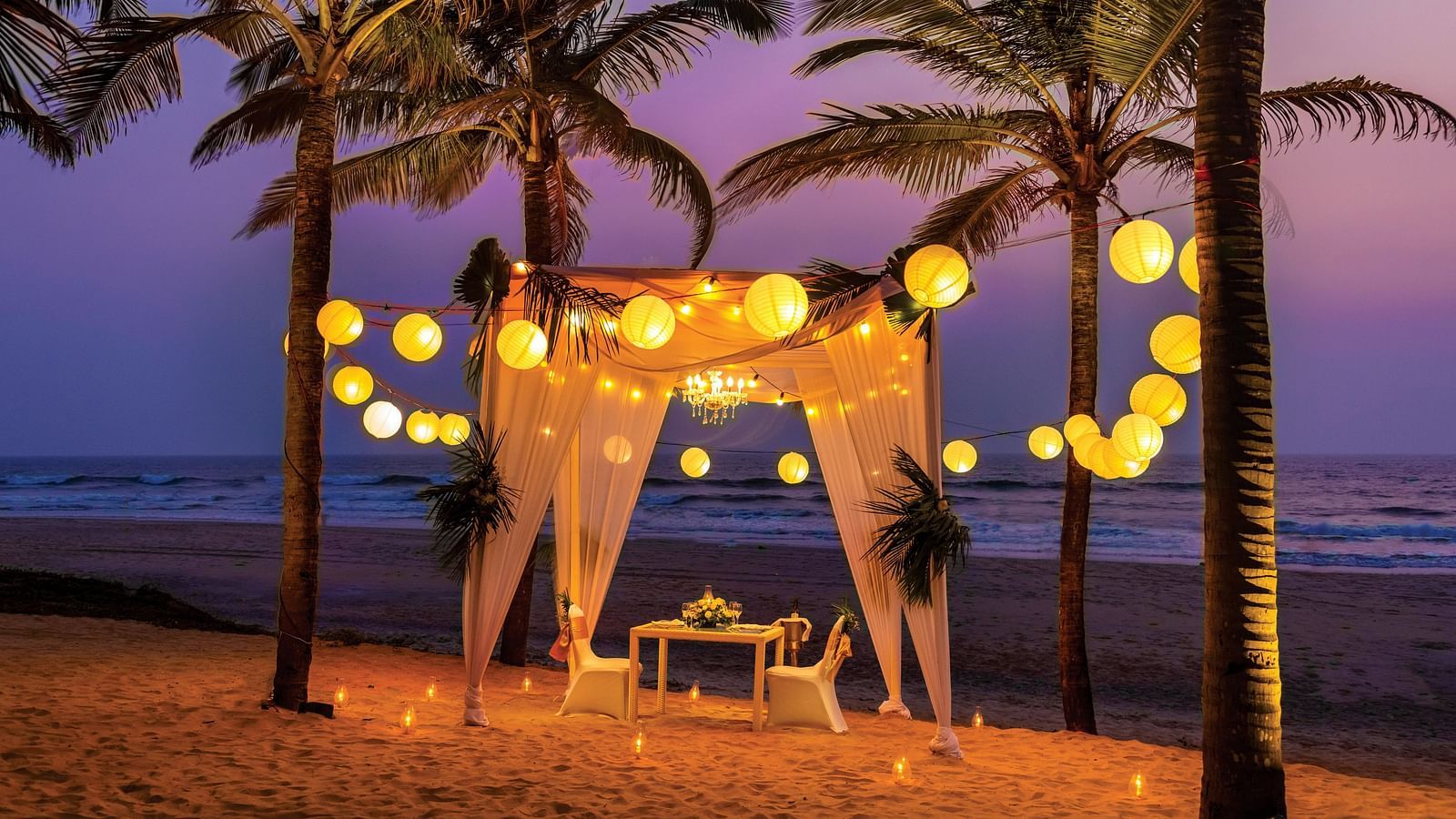 candlelight dinner on the beach with decorations - Caravela Beach Resort Goa