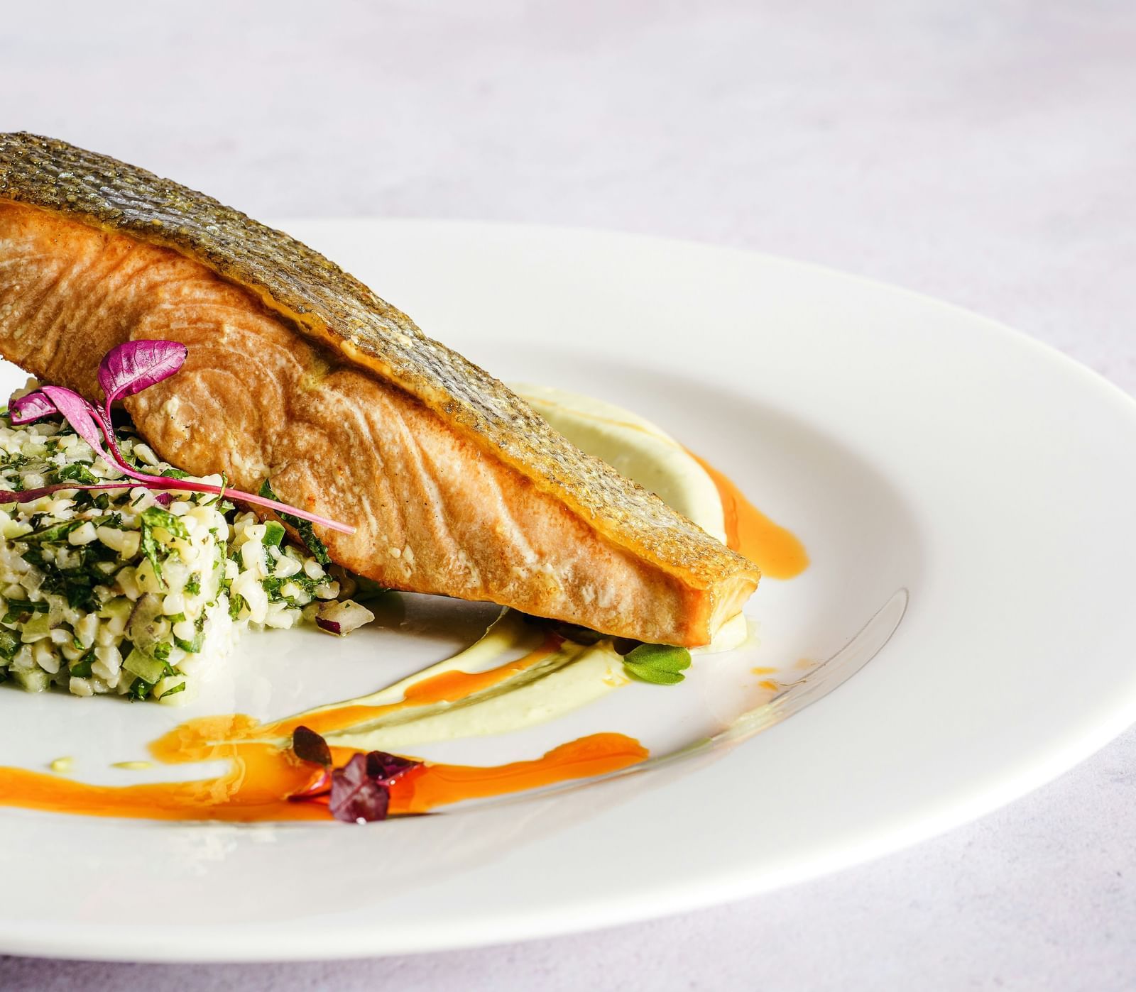 A neatly plated dish of fish.