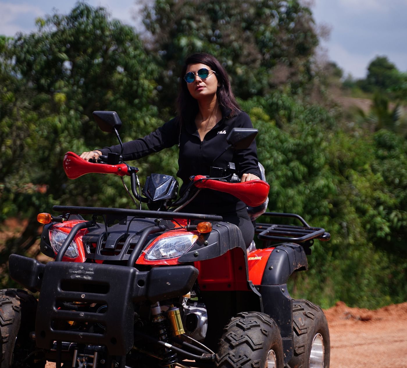 A guest riding the atv bike at Ravishing Retreat 