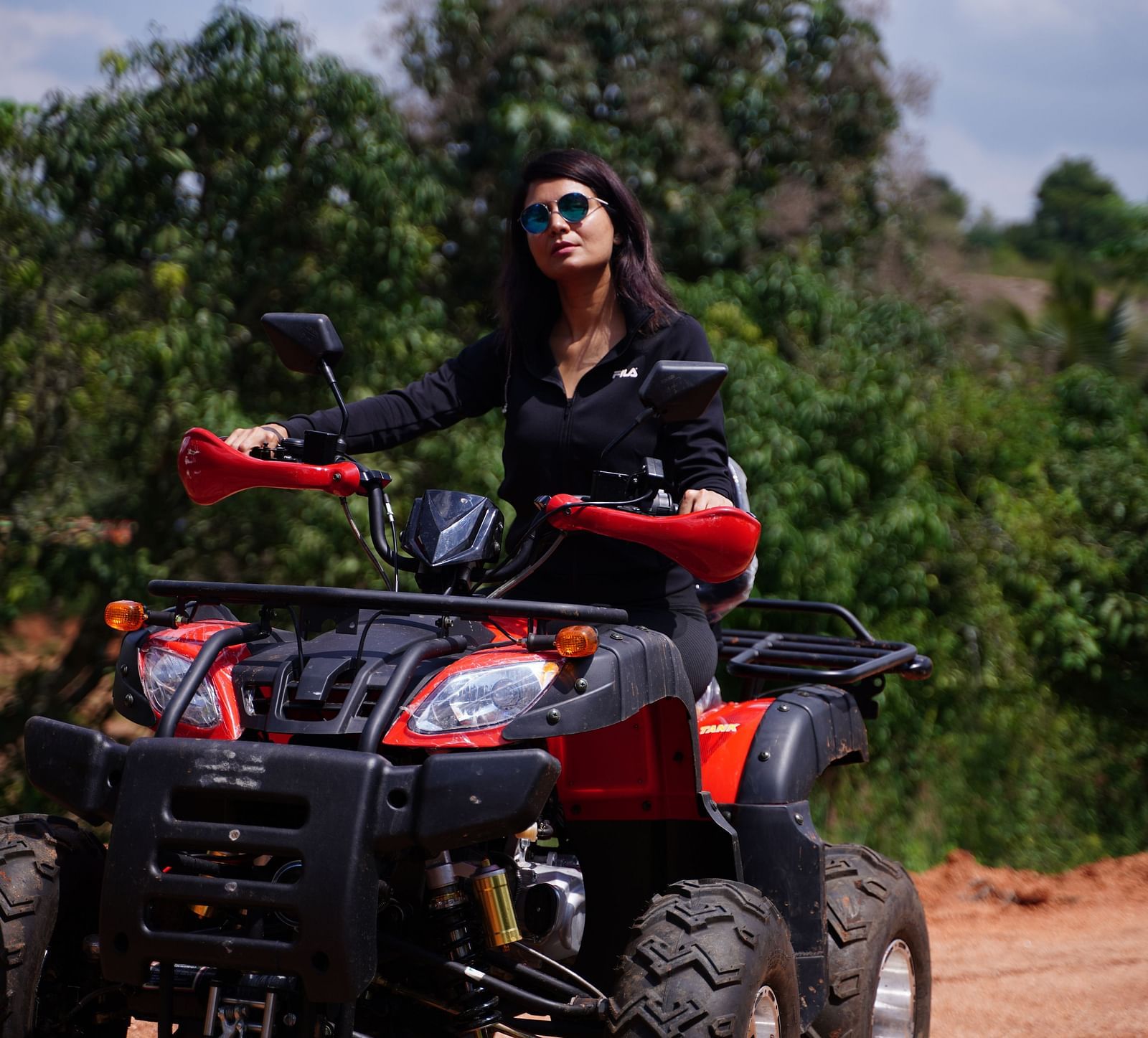 A guest riding the atv bike at Ravishing Retreat 