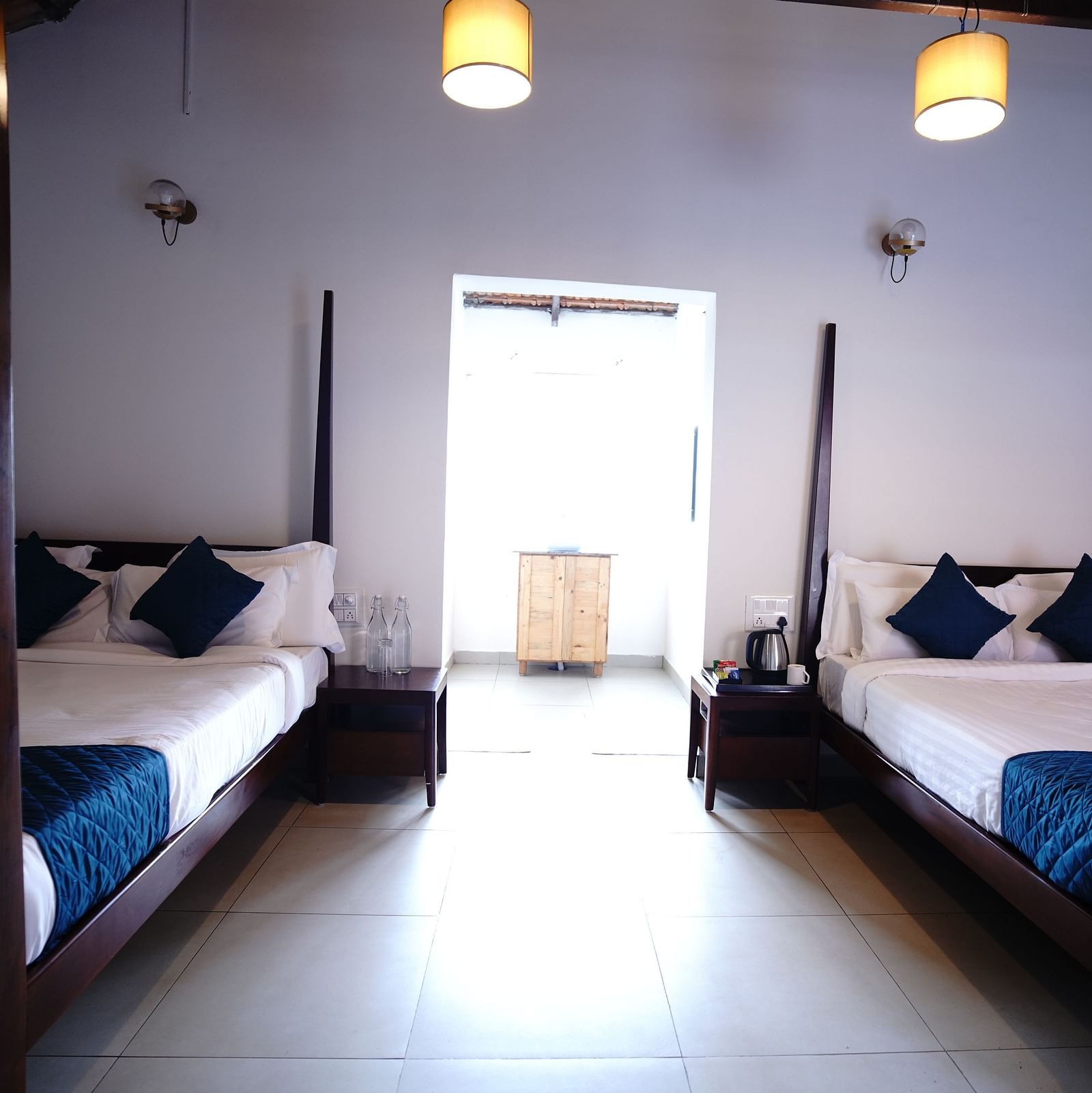 The twin bedding and the interiors of the Plumeria 4 Series at Ravishing Retreat