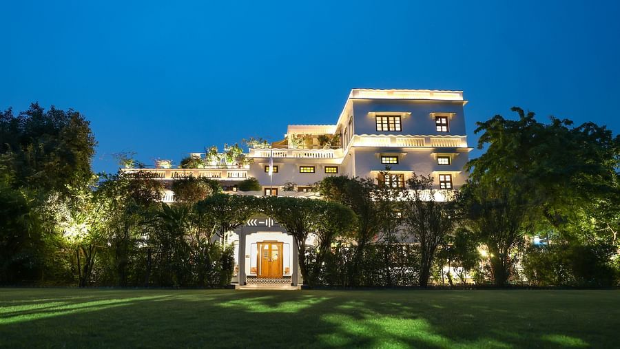 A view of the Saraca Hotel, Lucknow from the garden during blue hour