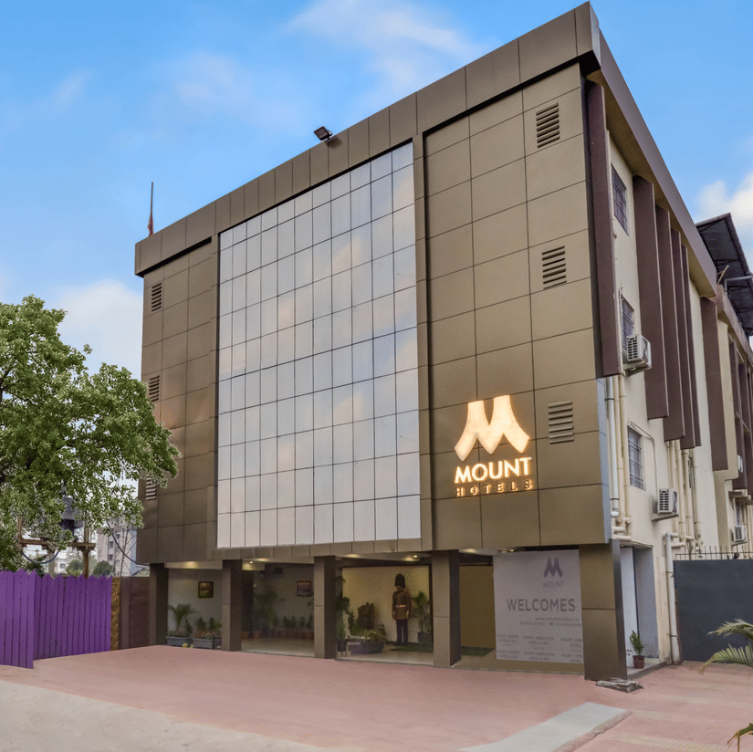 Mount Amara Hotel & Spa in Siliguri exterior featuring a modern structure with visible signage and clean architectural lines.