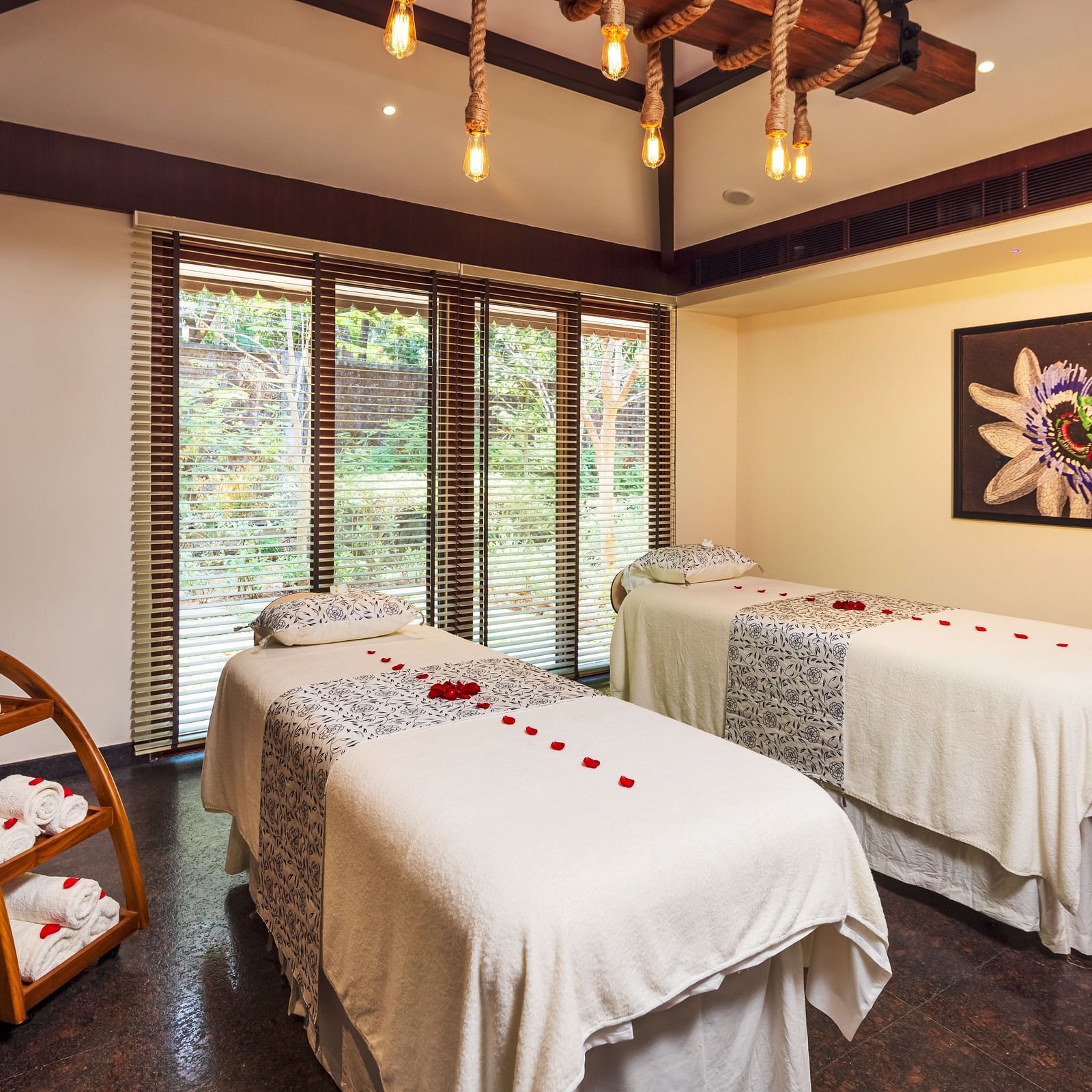 A massage room with two massage tables for couples massage - Gamyam Retreat