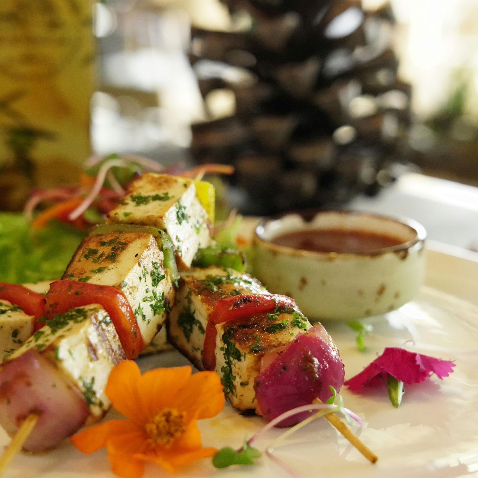 A dish plated well placed on a table.