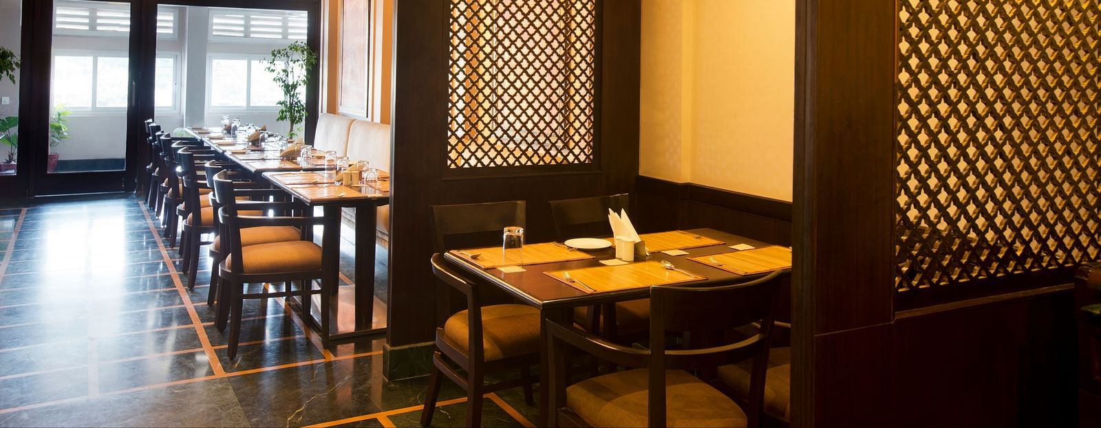 Multi-Cuisine Restaurant Annapurna with a closed dining setup - Ganga Lahari, Haridwar