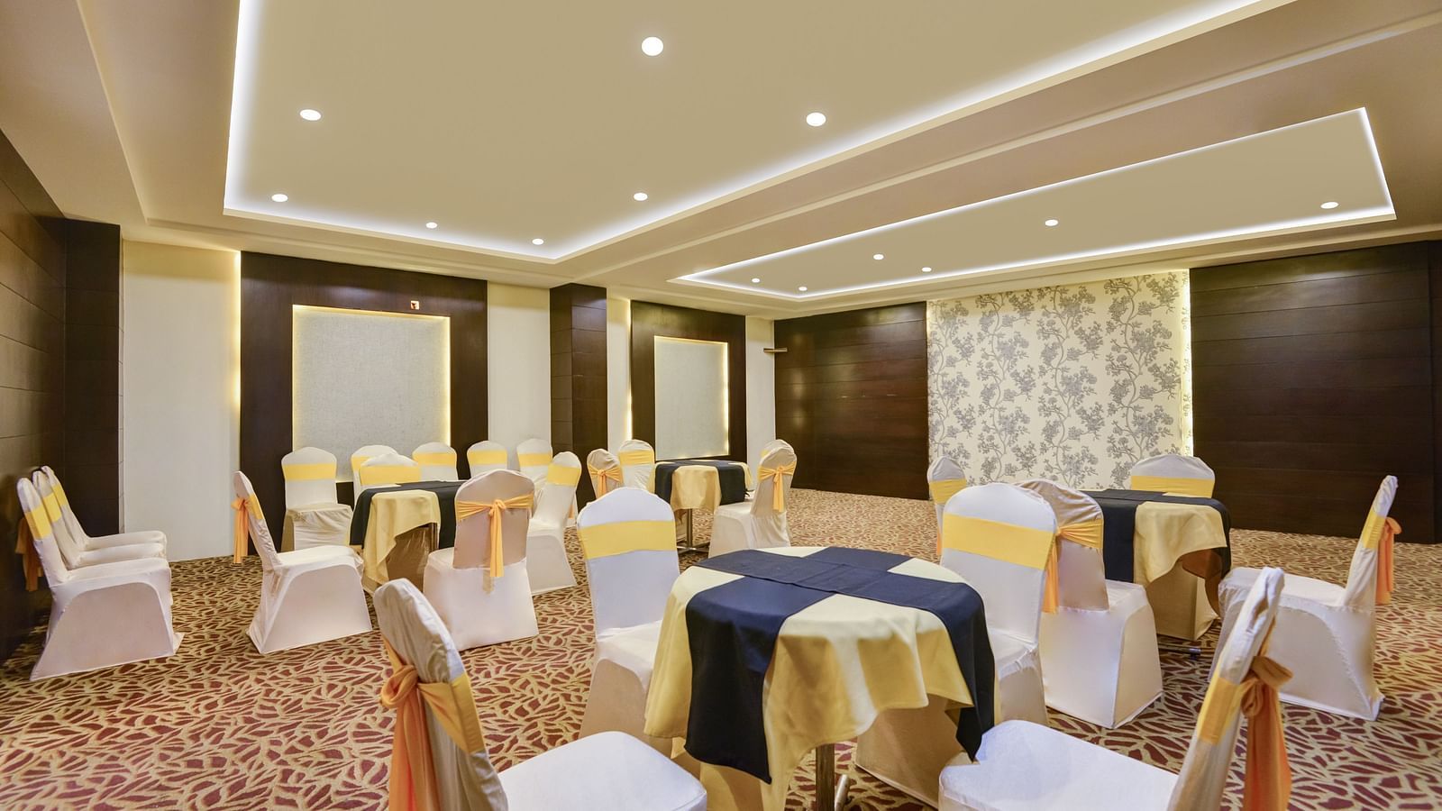 Banquet area with chairs arranged and decorated for the celebration