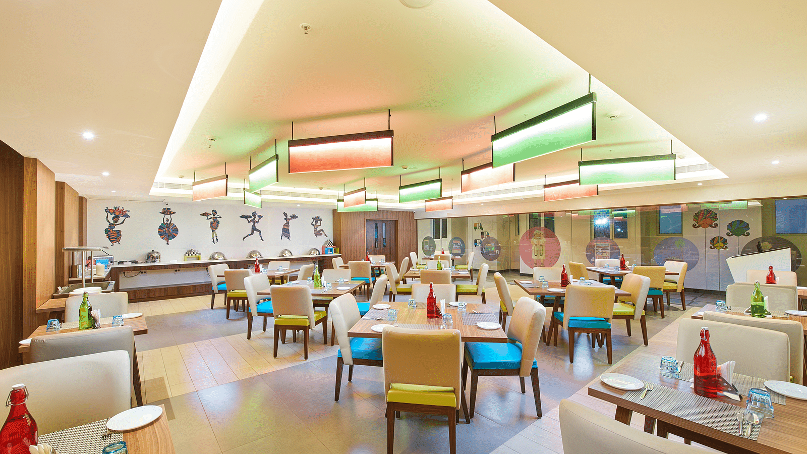 an image of a restaurant with illuminating modern lights  at Zibe Salem by GRT Hotels