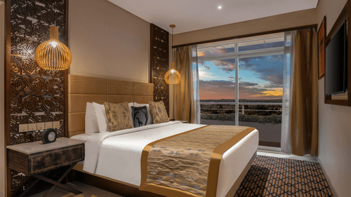 Deluxe Suite - Bedroom by night