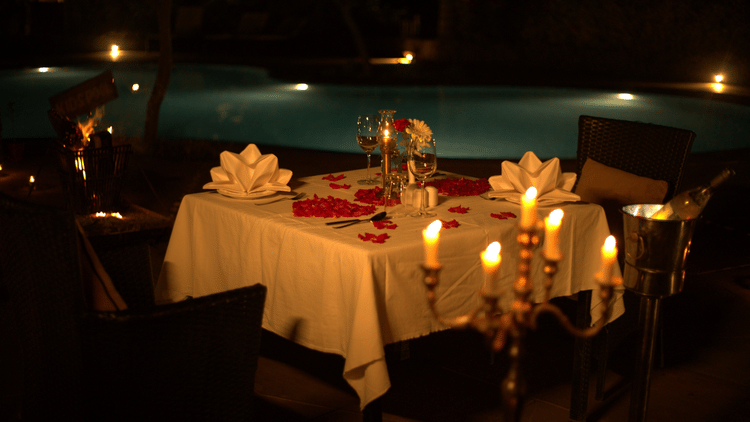 A table set up for a candlelight dinner