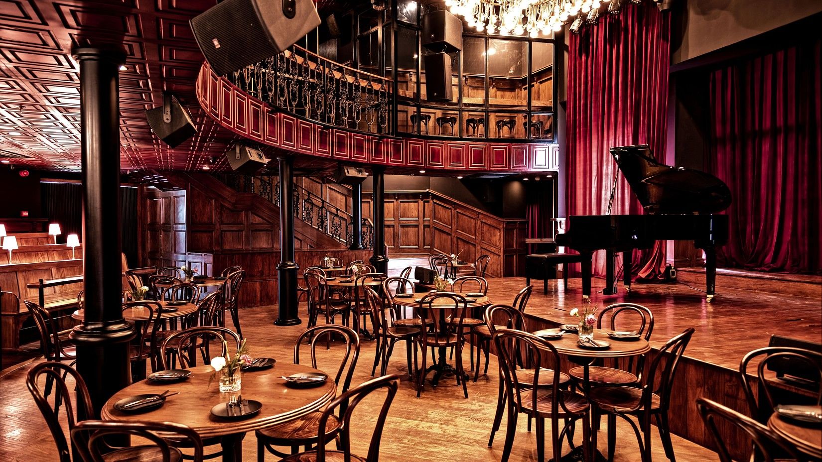 Elegant indoor restaurant with vintage-style seating and lighting