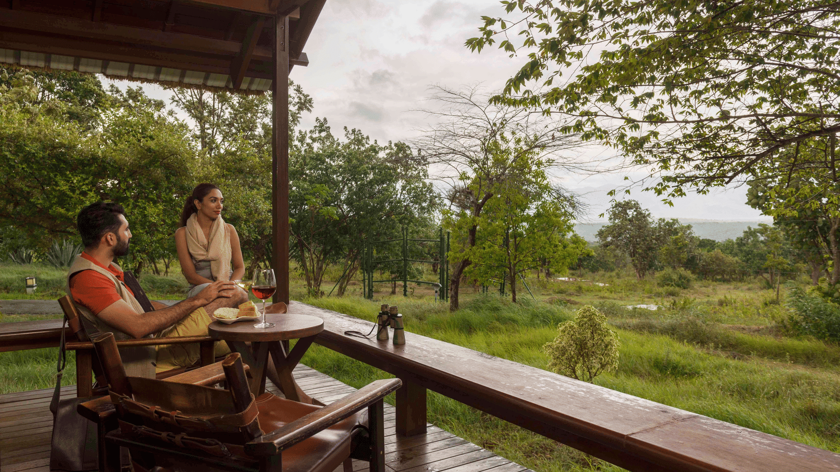 guests admiring the view from  Log Hut