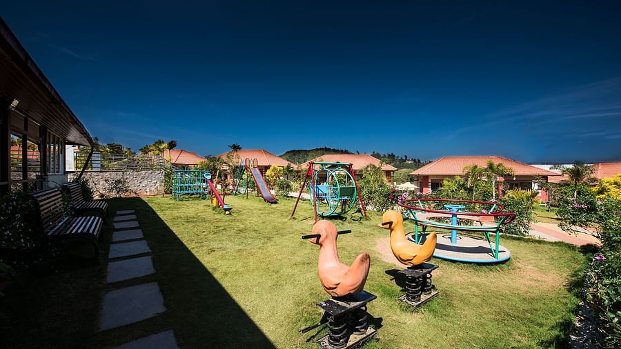 An outdoor play area during the day | Woodstock Resorts, Coorg