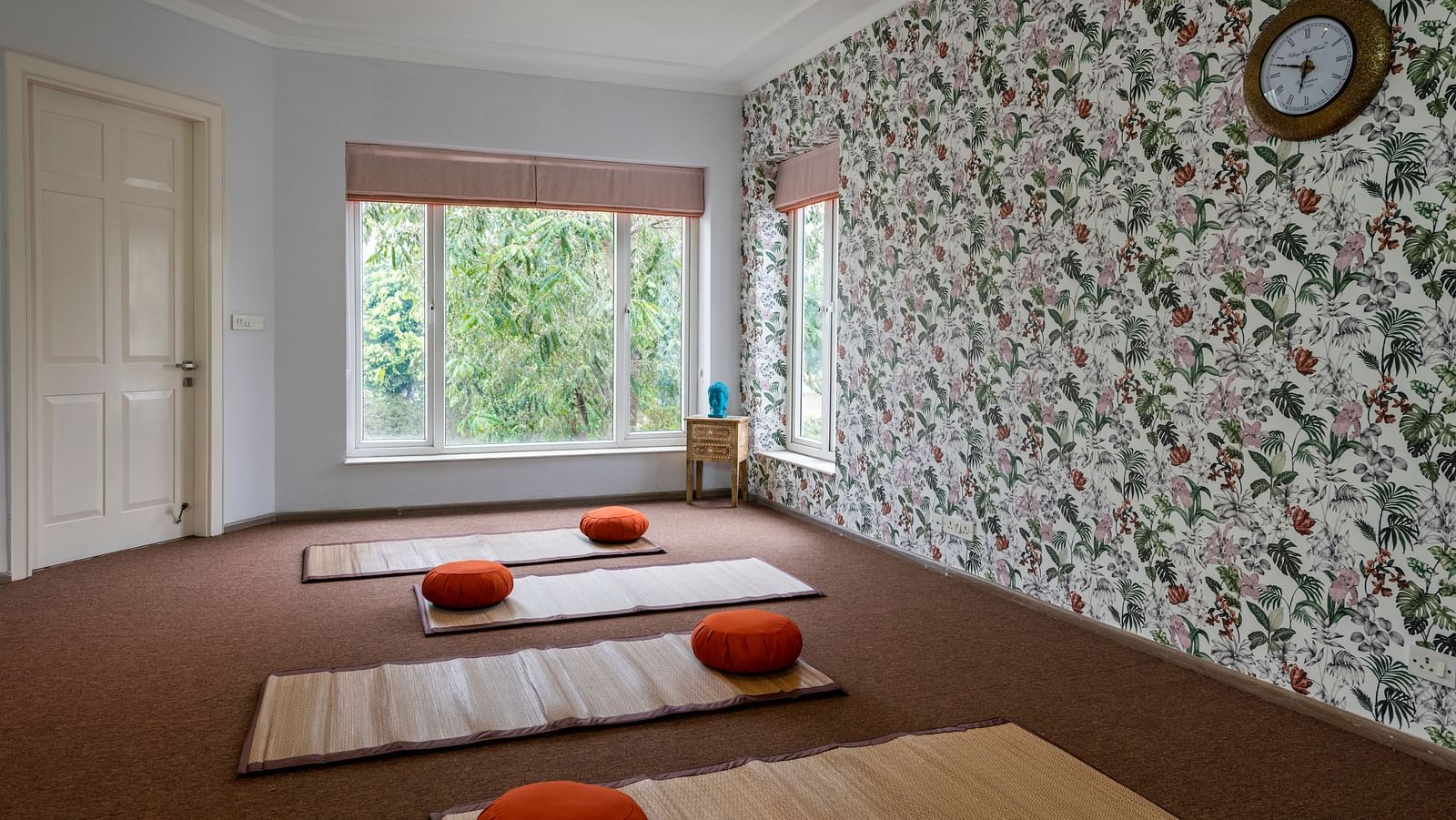 An image of a room with multiple mats on the floor.