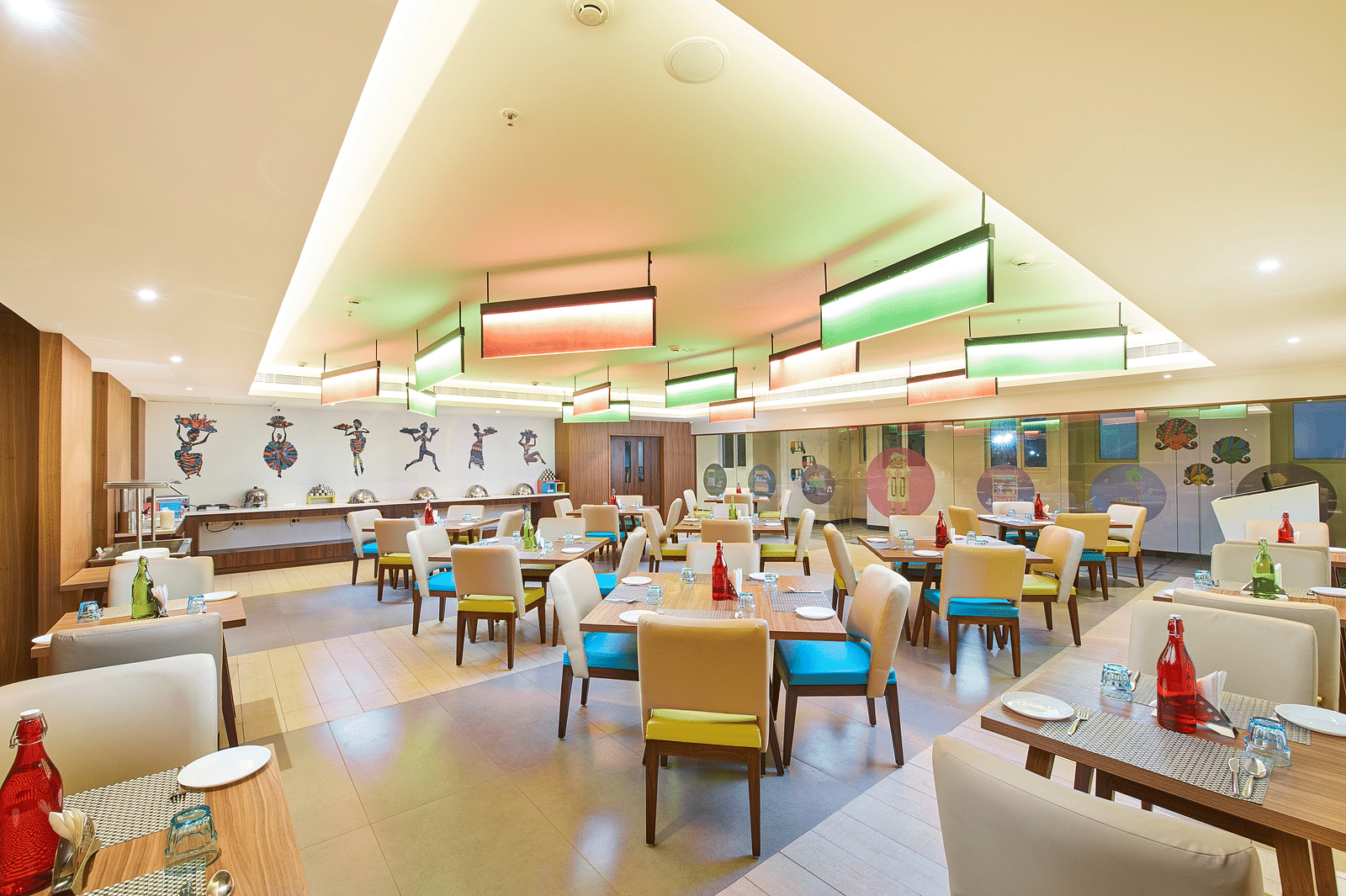 an image of a restaurant with illuminating modern lights  at Zibe Salem by GRT Hotels