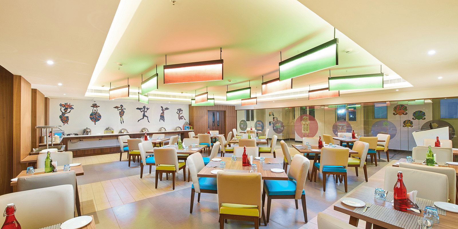an image of a restaurant with illuminating modern lights  at Zibe Salem by GRT Hotels