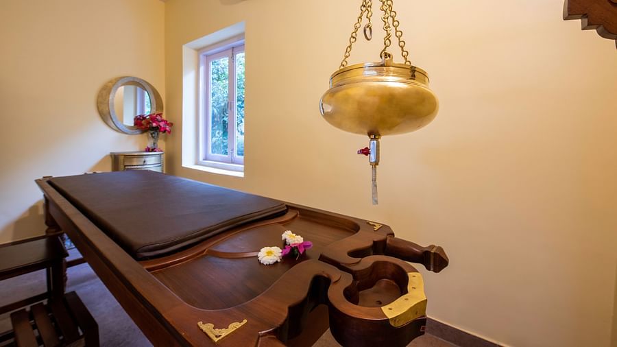 An image of a room with ayurvedic treatment in a spa at BluSalzz Resort.