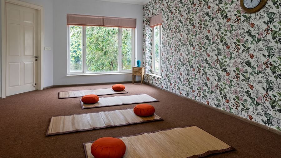 An image of a room with multiple mats on the floor.