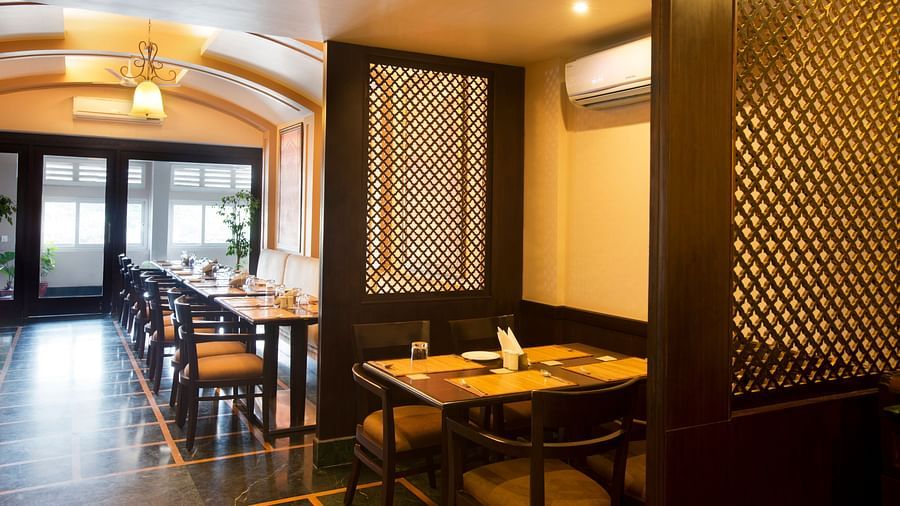 Multi-Cuisine Restaurant Annapurna with a closed dining setup - Ganga Lahari, Haridwar