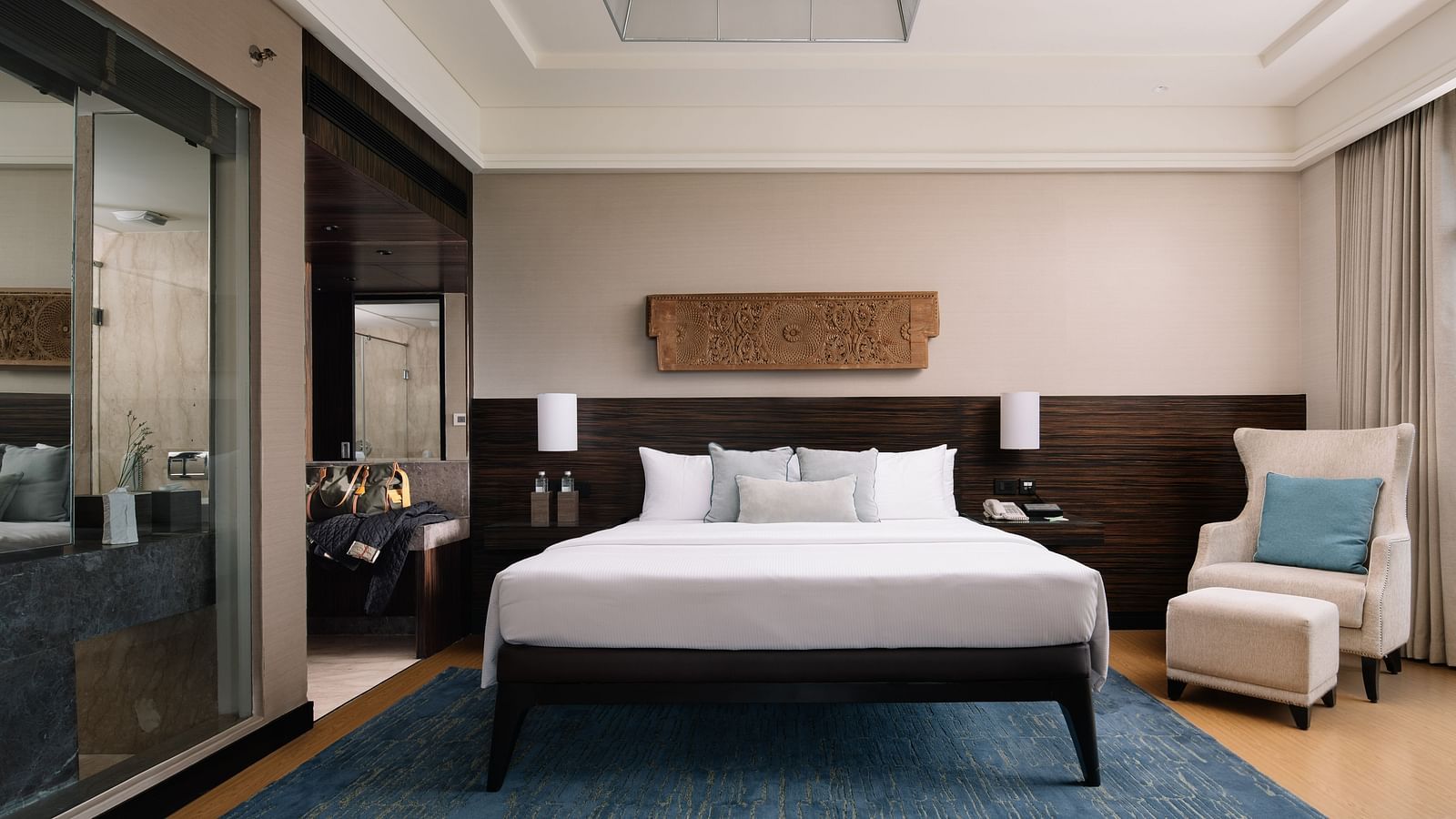 Image of Executive Suite at The Raintree St. Mary s Road with a bed and a sofa