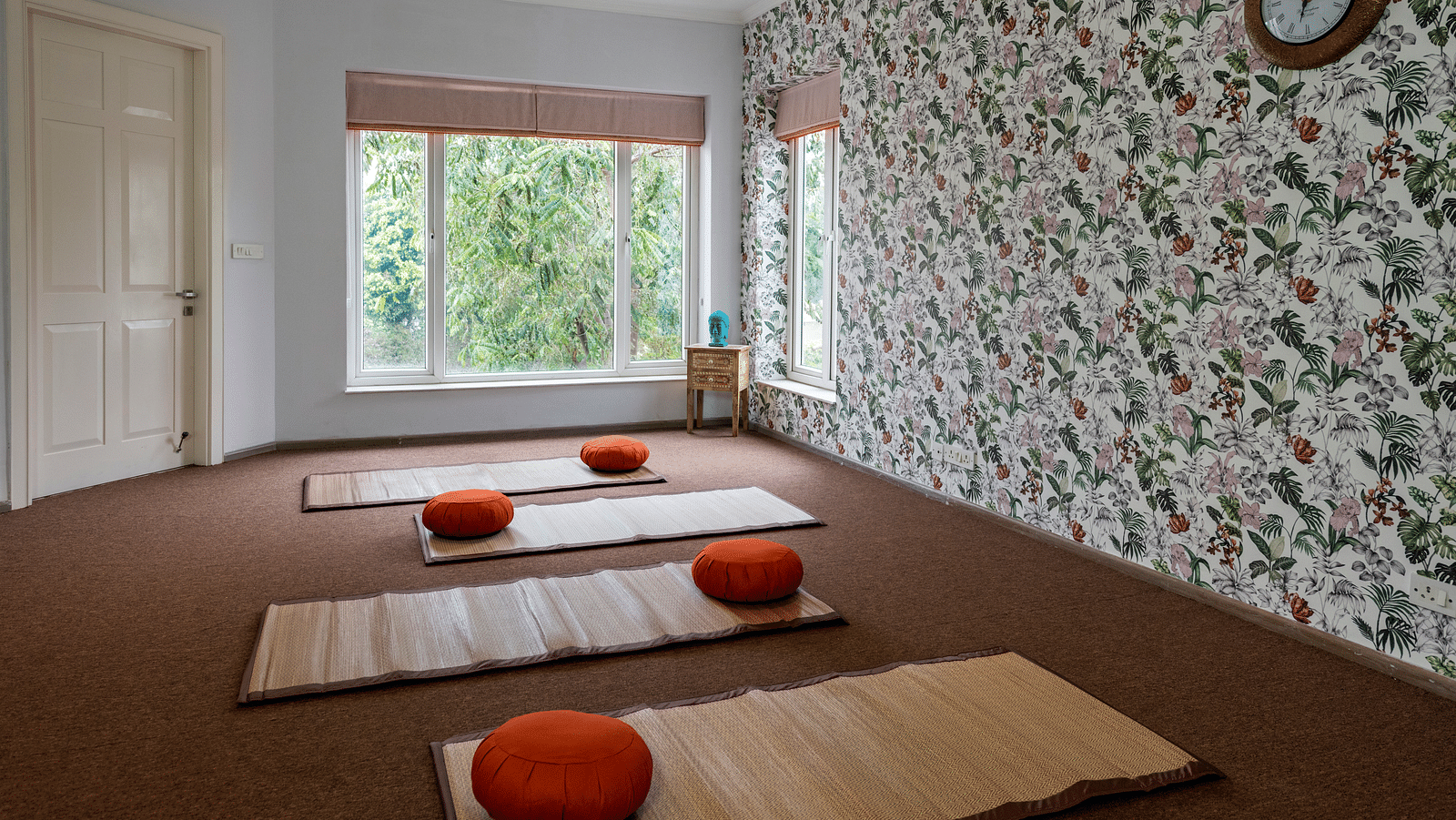 An image of a room with multiple mats on the floor.