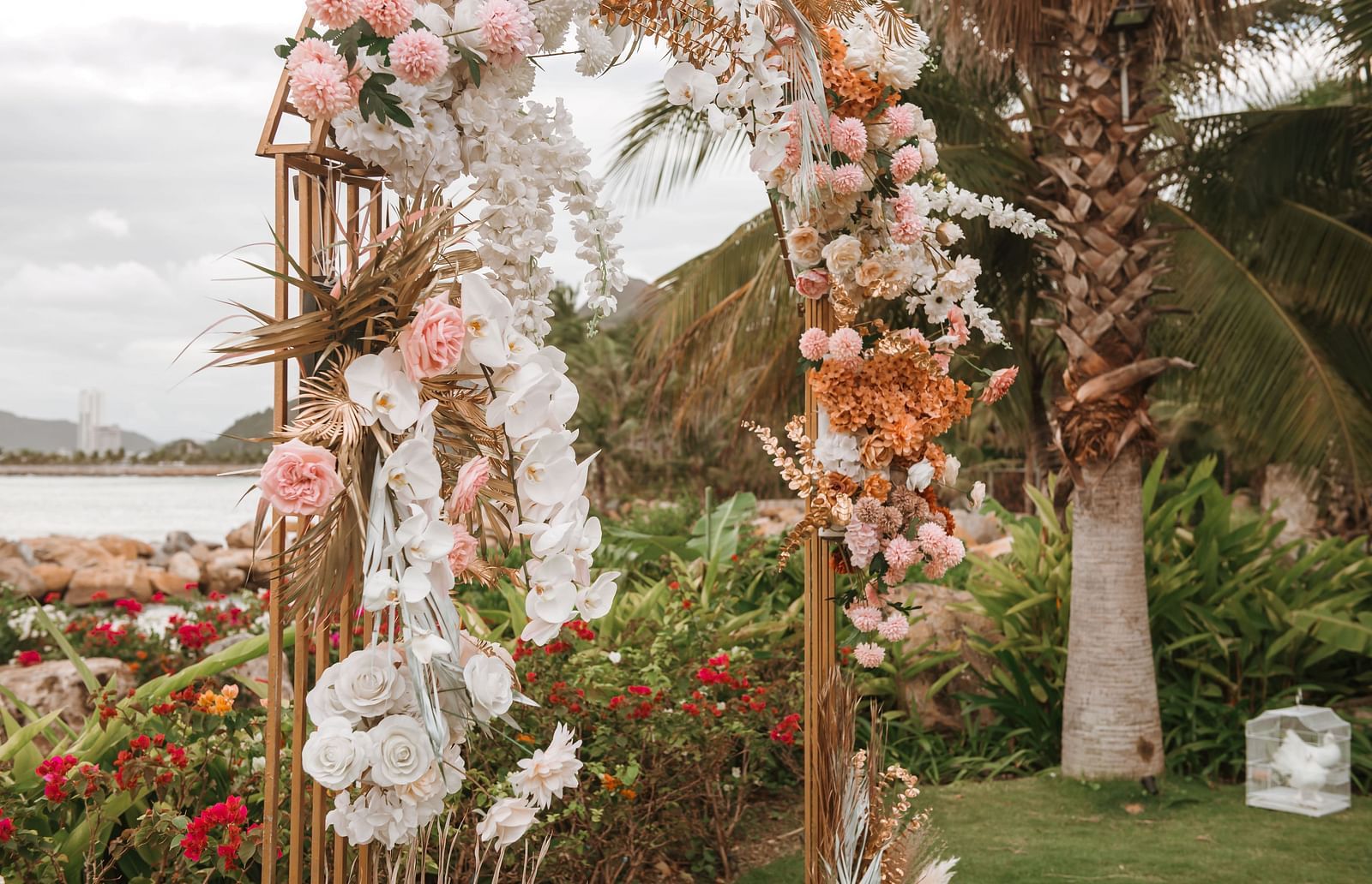 An outdoor image decorated by flowers - Alibu Resort Nha Trang