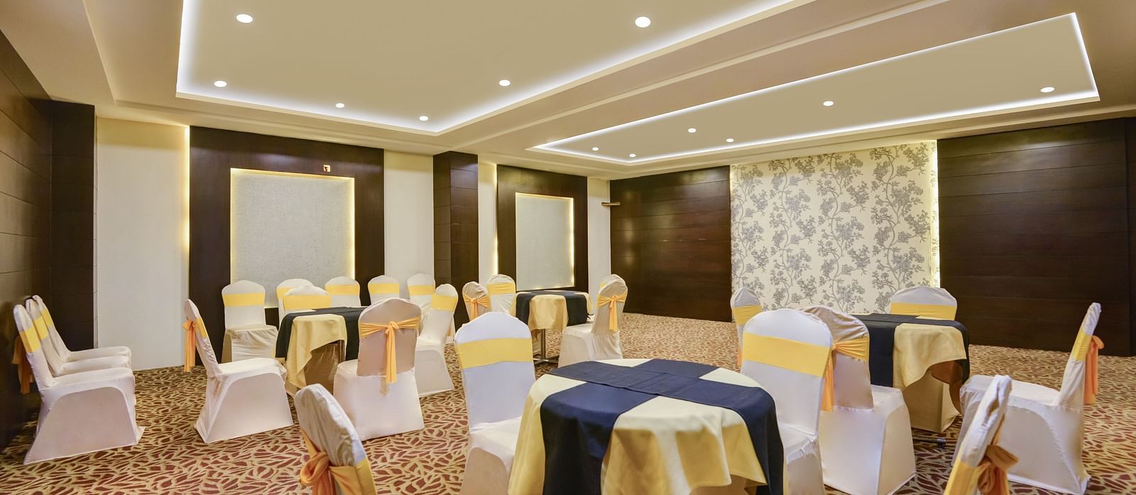Banquet area with chairs arranged and decorated for the celebration