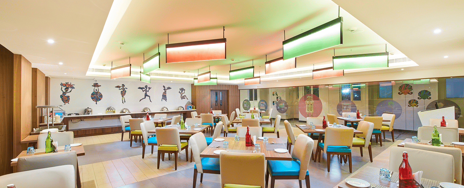an image of a restaurant with illuminating modern lights  at Zibe Salem by GRT Hotels