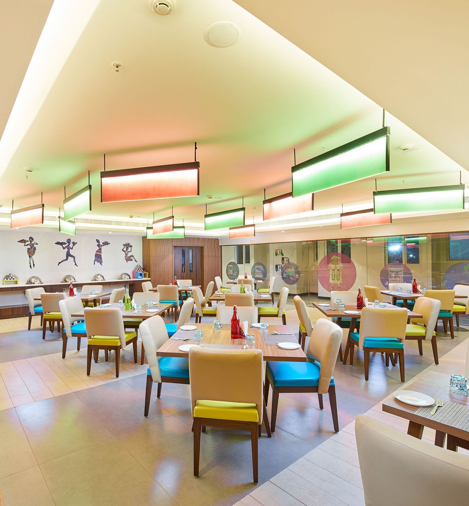 an image of a restaurant with illuminating modern lights  at Zibe Salem by GRT Hotels