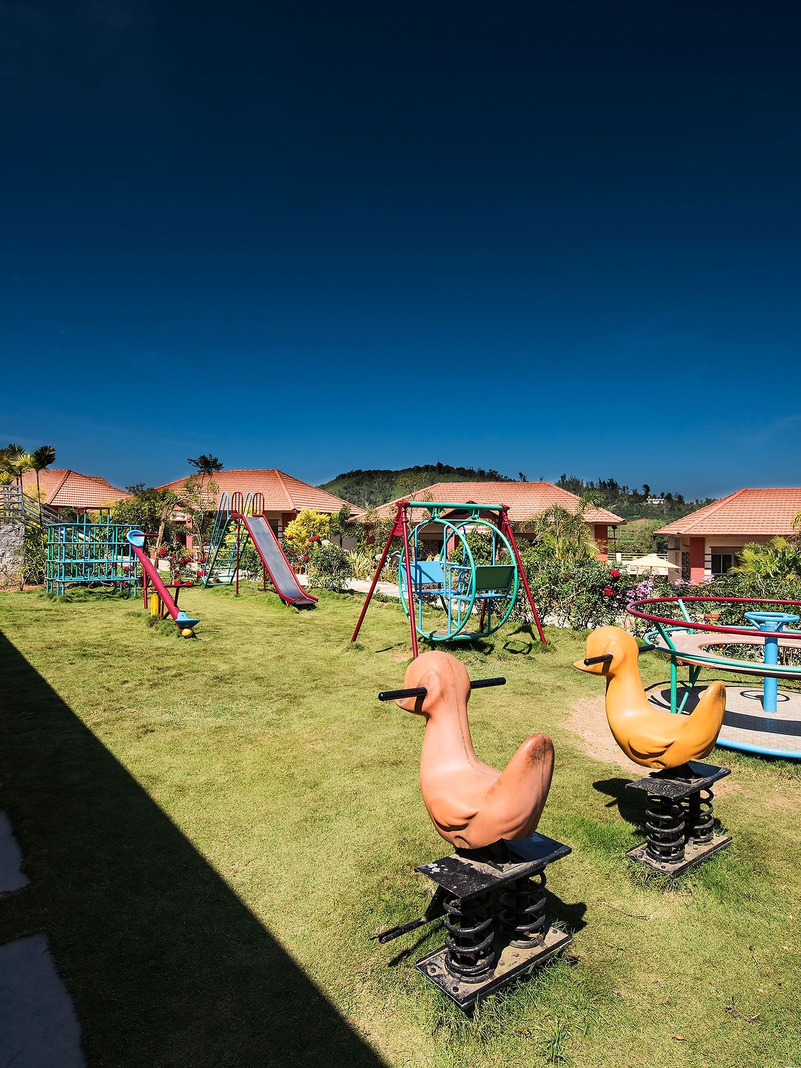 An outdoor play area during the day | Woodstock Resorts, Coorg