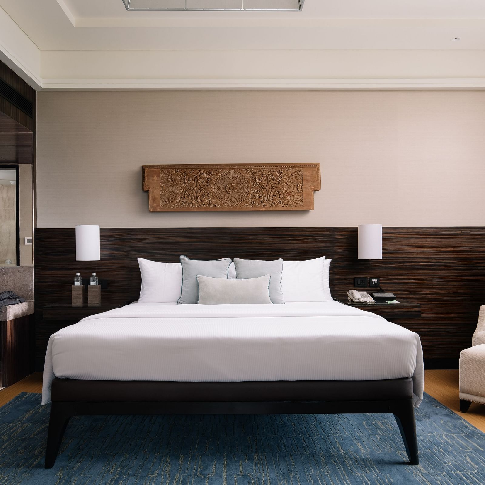 Image of Executive Suite at The Raintree St. Mary s Road with a bed and a sofa