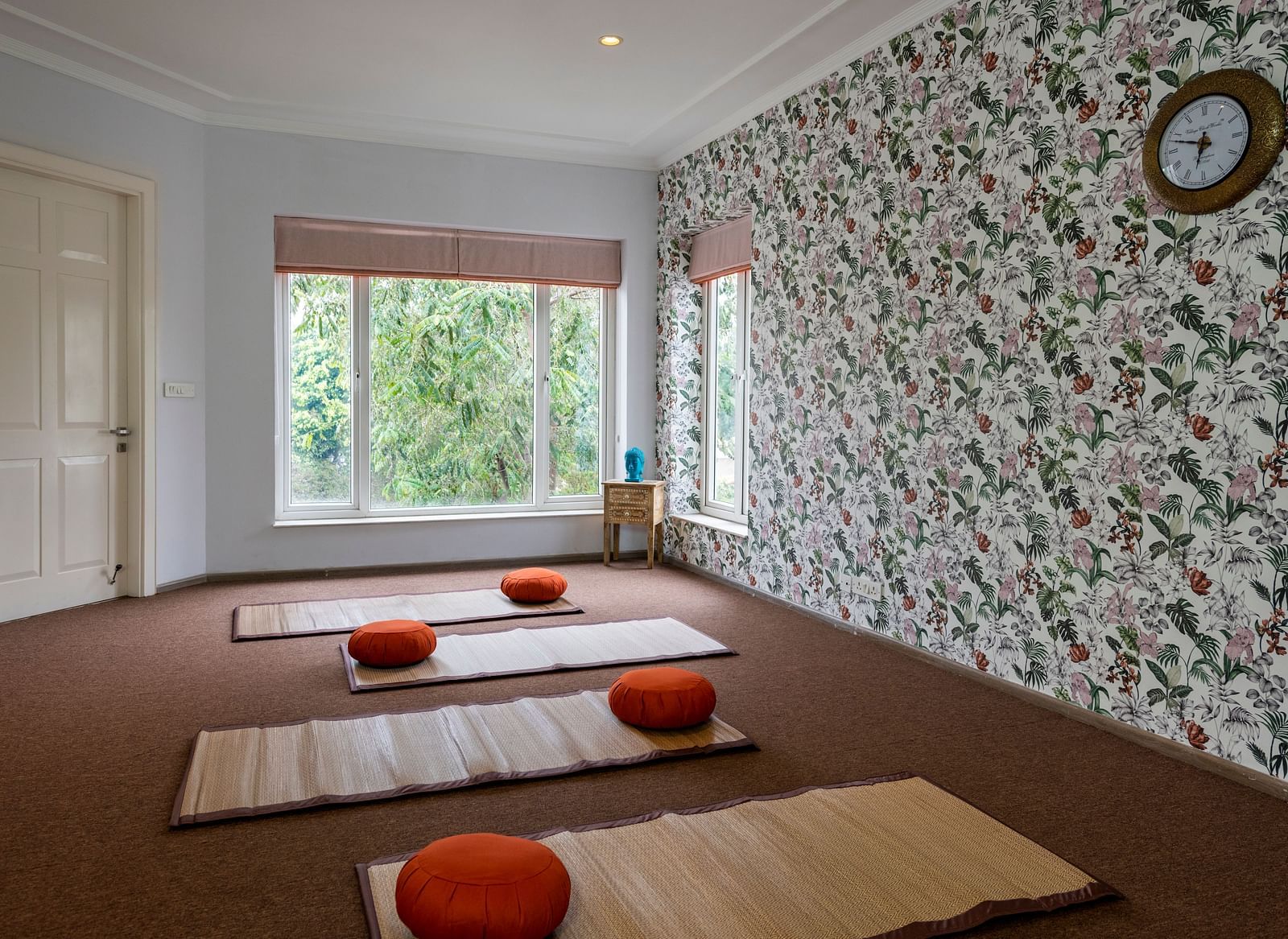 An image of a room with multiple mats on the floor.