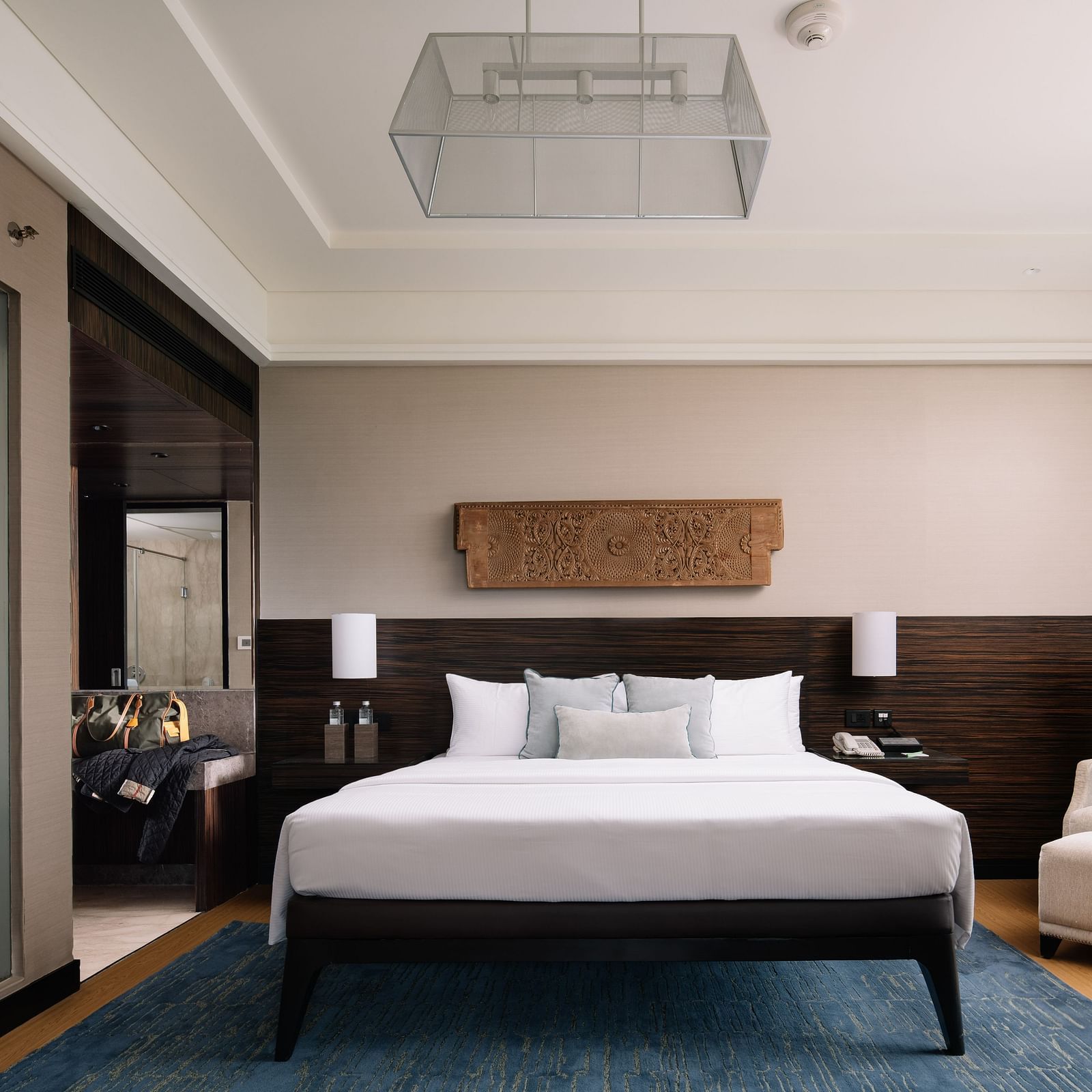 Image of Executive Suite at The Raintree St. Mary s Road with a bed and a sofa